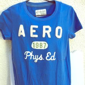 Aero 1987 Phys Ed Graphic Tee NWOT